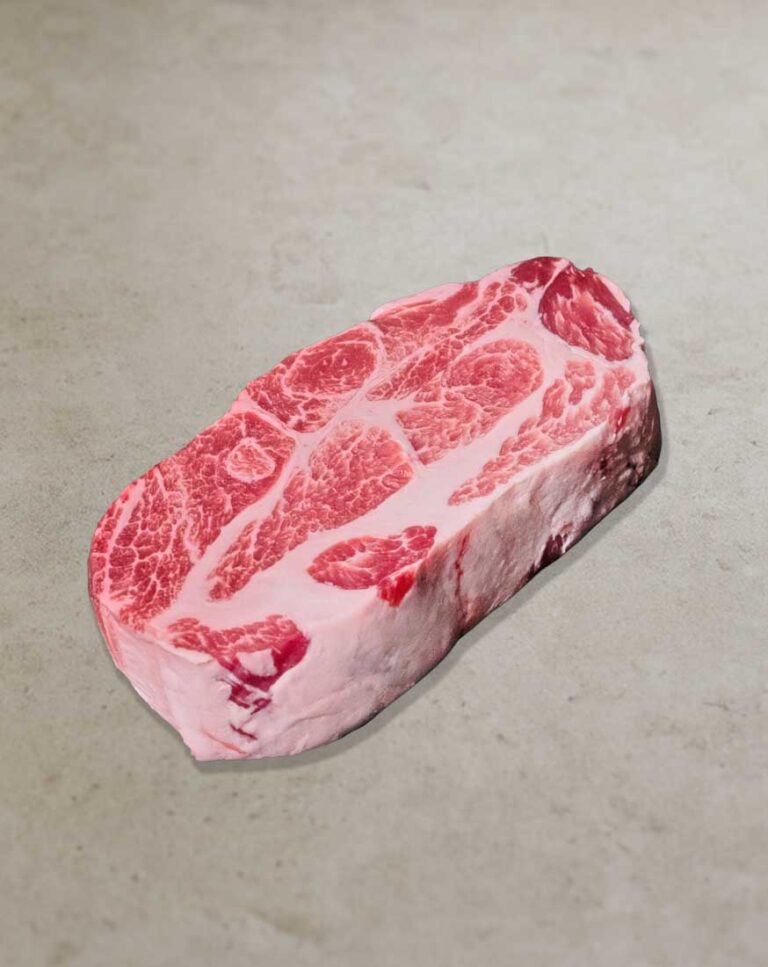 Nackensteak vom Ibérico-Schwein mit feiner Marmorierung und saftiger Fleischstruktur