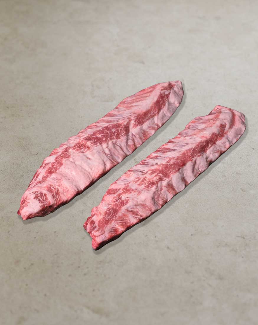 Spareribs-vom-Ibérico-Schwein Spareribs vom Ibérico-Schwein mit saftiger Fleischstruktur und feiner Marmorierung